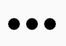 Three black dots in a row